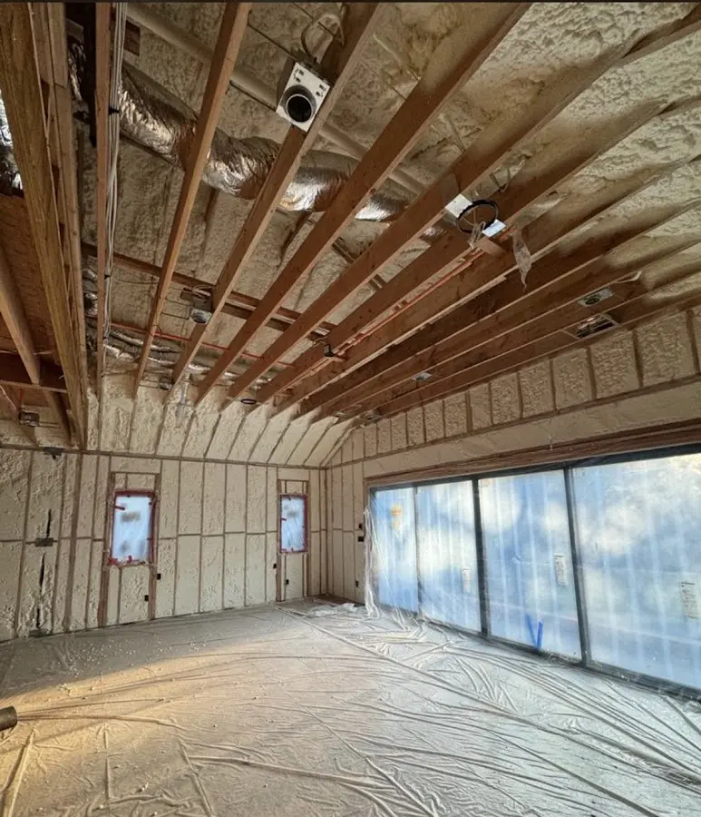 Interior walls and ceiling insulated with spray foam during new construction in Wolf Trap